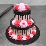 Delicious Fresh Cream Cake – Two-Tiered Cake with Floral Decoration and Chocolate Drip